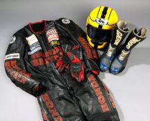 Winner Joey Dunlop`s 1998 Isle of Man Lightweight TT race outfit, comprising an Arai ventilated