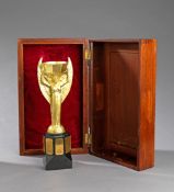 A gilt-metal full-size replica of the Jules Rimet Trophy circa 1970, faithfully reproduced, marble