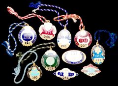 Ten gilt-metal & enamel Aintree member`s badges for the Liverpool County Stand dating from the