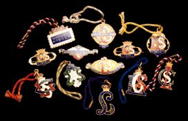 Twelve gilt-metal & enamel Aintree member`s badges for the Liverpool County Stand dating from the