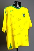 A replica Brazil jersey signed by 12 members of the 2002 World Cup winning team, signatures in black