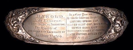 A piece of silver plate removed from a trophy originally presented to Arthur Yates who owned,