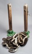 A complete F.H. Ayres of London lawn tennis set early 20th century, two wooden posts, green