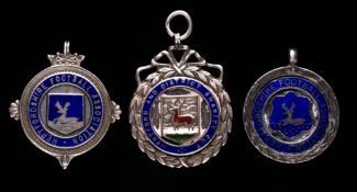 Three Hertfordshire Football Association medals 1920s/30s, for the Charity Shield and Charity Cup,