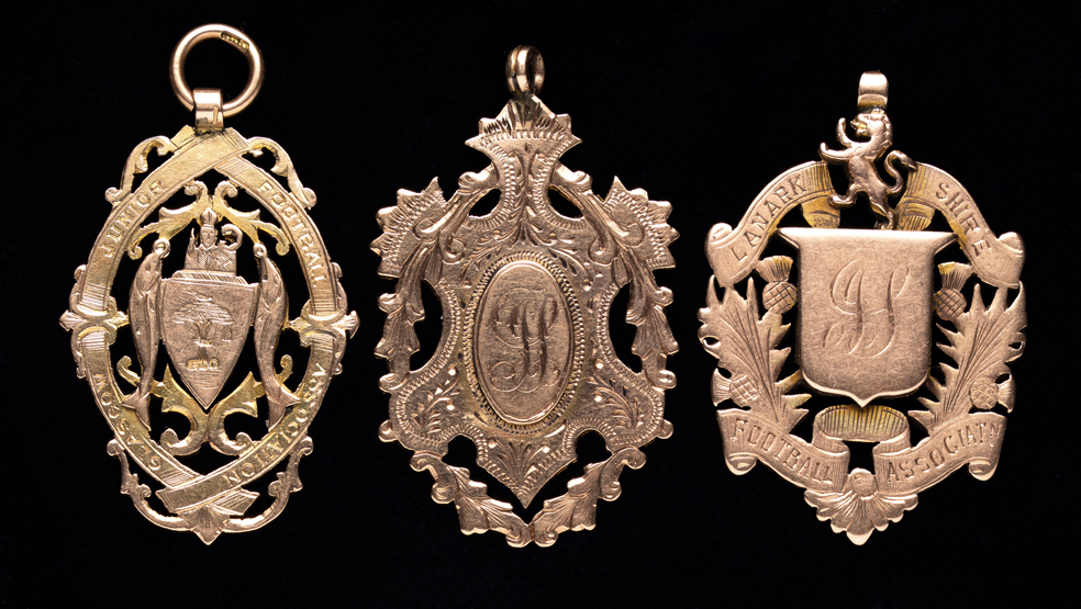 Three 9ct. gold medals awarded to Jimmy Stewart, i) Lanarkshire F.A., won at Motherwell in 1907-
