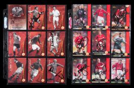 An album containing sets of Futera Manchester United Collectors Cards issued in 1997 and including