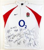 An England rugby shirt signed by the 2003 team immediately prior to the World Cup, signatures in