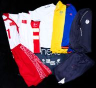 A group of London 2012 Olympic clothing, i) A Naz Aydemir Turkey No.11 volleyball shirt. ii) a