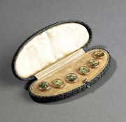 A very unusual cased set of six gold gentlemen`s waistcoat buttons set with coloured prints of
