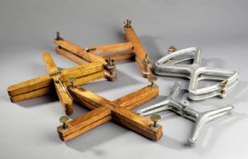 Five racquet presses, the oldest a Central Press by F.H. Ayres of London circa 1880, crossed shaped;