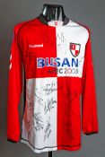 A Busan IPark jersey that was signed by the South Korean team and presented to their coach Ian