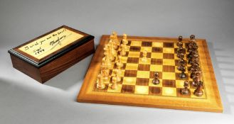 Chess set signed by Gary Kasparov, the chessmen`s box signed by the grandmaster in black marker