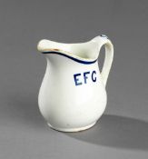 An Everton Football Club pottery milk jug circa 1900, vitrified earthenware, white glaze with blue