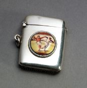 A silver & enamel football vesta case circa 1920s, set with a raised roundel depicting two