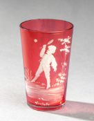 A Mary Gregory-style cranberry glass beaker depicting a finely detailed slip drawing of boy