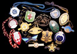 16 gilt-metal & enamel racecourse member`s badges, Hurst Park 1922 & 1955, Sandown Park 1925, a pair