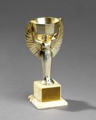 A gilt-lacquered miniature replica of the Jules Rimet Trophy, on a marble base (repaired) with