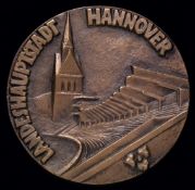 A large bronze medallion presented to Cyril Knowles on the occasion of the Germany v England
