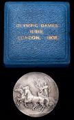 A 1908 London Olympic Games cased silver judge`s participation medal, by Vaughton, silver version,