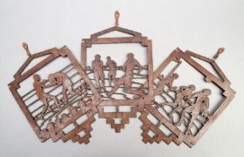 A trio of cedarwood lantern shade with the openwork decoration depicting a football match, a