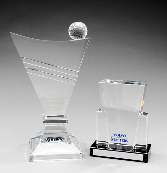 Two Volvo Masters glass presentations to Jaime Ortiz-Patiño, both the v-shaped sculptural designs,