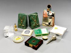 A miscellany of modern golf collectibles, table mats & coasters, paperweights, bottles, enamel