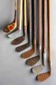 A group of eight golf clubs, i) an early cleek by a maker unknown, circa 1880, hickory shaft,
