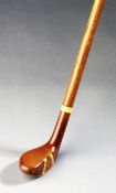 A walking stick with persimmon head circa 1930, hickory shafted