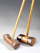 Two rare French mid-18th century jeu de mail clubs, both with hardwood and iron bound cylindrical