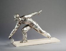 A silvered sculpture of a gentleman tennis player 1930s, possibly a trophy originally, the figure