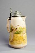 A German pewter lidded earthenware beer stein by Villeroy & Boch circa 1910 with later overglaze