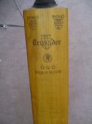 An autographed cricket bat from 1959, `Gray-Nicolls Crusader` full-size bat signed on both sides