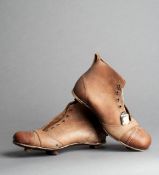 An unused pair of `Alex James Shurshot` leather football boots, still with original price tag marked