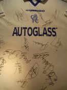 A team-signed replica white Chelsea away jersey circa 1999, approx. 20 signatures in black marker
