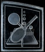 A heavy glass panel with tennis designs originally installed at a sports centre in the 1950s, images