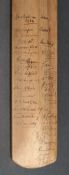 A child`s-size cricket bat autographed by teams touring Ceylon circa 1934-1936, the face signed by