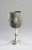 A Thai silver trophy for bowling circa 1922, traditional decoration with a circular panel