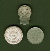 Three medals/badges relating to the Baltic Games of 1914, a Malmo medal 1914, an official`s badge