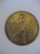 A Sandy Lodge golf medal, in silver-gilt, stamped sterling silver, circular, the obverse cast with a