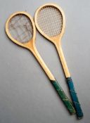 A pair of strung table tennis racquets with unusually small heads circa 1900, no maker`s mark, one