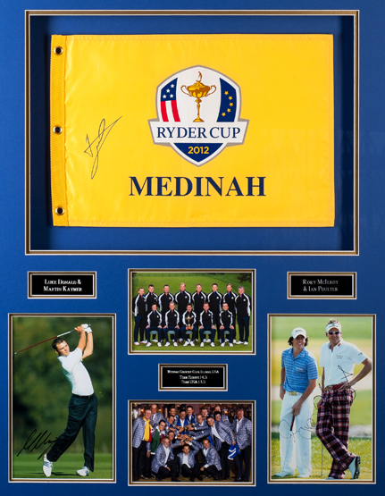 A signed 2012 Ryder Cup presentation, comprising a Medinah souvenir pin flag signed by Luke