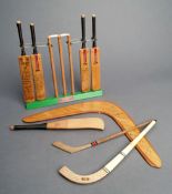 A Gray-Nicholls cricket salesman`s or shop display, comprising four miniature model bats and a set