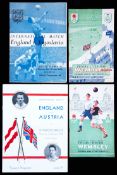 A collection of 53 England home programmes, pre-war v Austria at Stamford Bridge in 1932, and then
