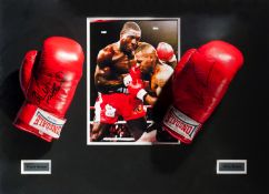 A Mike Tyson/Frank Bruno signed boxing gloves presentation, two red right-hand Everlast gloves,