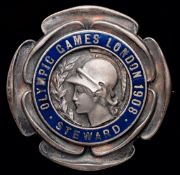 A 1908 London Olympic Games steward`s badge, in silvered bronze & blue enamel by Vaughton`s of