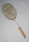 `The Thors` a steel lawn tennis racquet with metal strings by Slazengers circa 1925, with a wooden