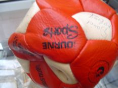 A signed Manchester United football from the 1977-78 season, a red & white panelled ball, 12