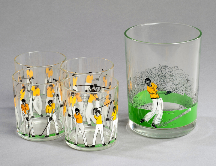 A golfing drinks set, American, 20th century, comprising a set of our glasses with applied