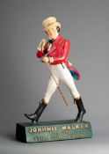 A very rare & large Johnnie Walker whisky advertisement figure carrying a long nosed club, 74cm.,