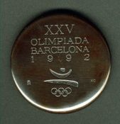 A 1992 Barcelona Olympic Games participation medal, designed by Xavier Corbero, Olympic emblem and